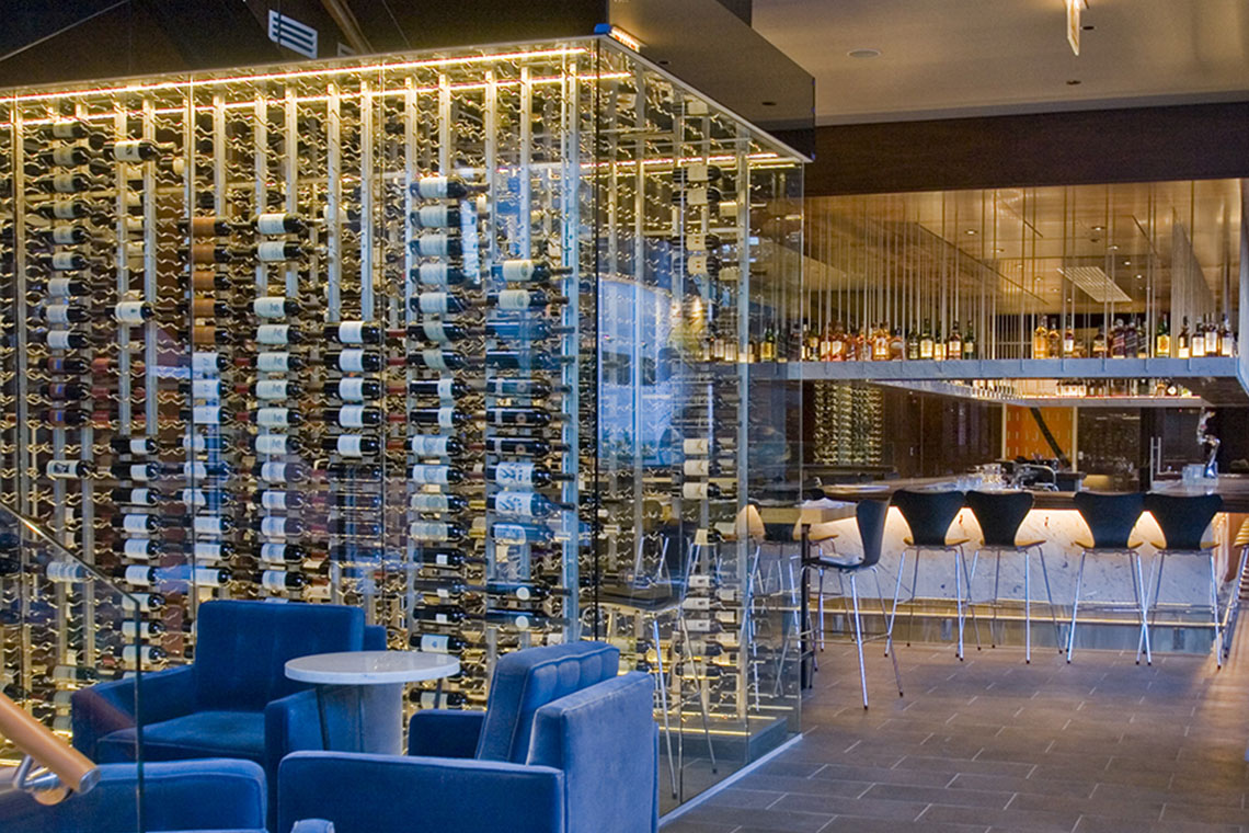 III Forks Steakhouse main entry way and wine room, interior lighting